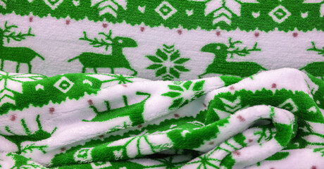 Velvet. Plush. For winter wear. Snow deer, snowflakes. Green and white tones. Silk fabric with soft, smooth and thick pile. Rich Silk Cloth.