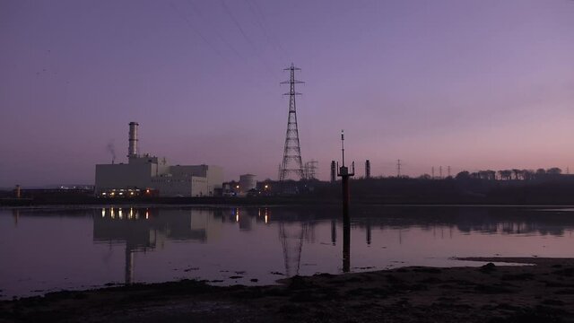Power station producing energy on the banks of the River Foyle near Derry, Northern Ireland