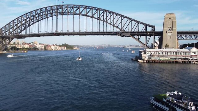 Drone Aerial Shot Of Ferry Party Boat In Sydney Harbour Channel With Bridge Walsh Bay Port Jackson City Tourism Landmark NSW Australia 4K