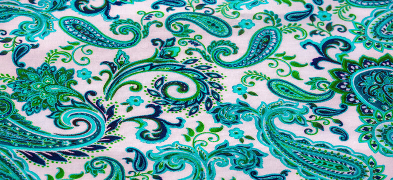 paisley pattern on white background. polyester cotton, this is an ornamental textile pattern using bote, a teardrop-shaped motif with a curved top end. Persian origin