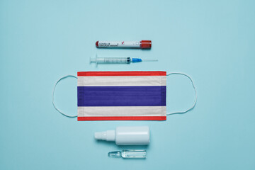 Blood tube for test detection of virus Covid-19 Omicron Variant with positive result, medicine mask...