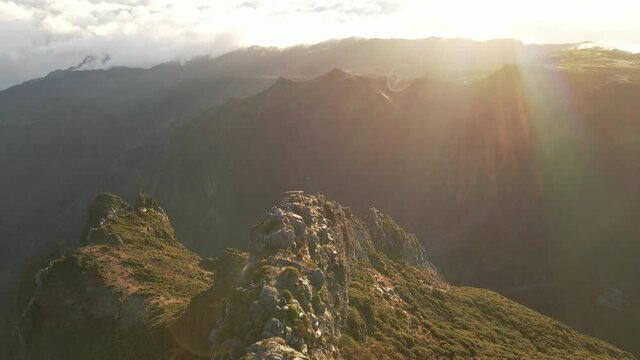 Epic FPV racing drone shots of Madeira Portugal during sunrises. The drone is going super fast and will be close the land. 24