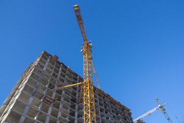 Construction of an apartment building. Construction of a multistorey concrete building.