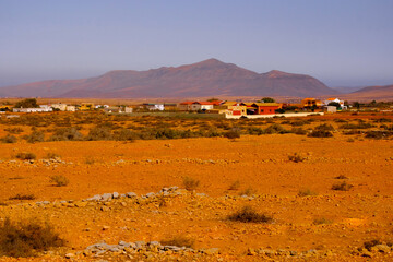 Landscape view with red volcanic earth in the center of the Canary Island of Fuerteventura