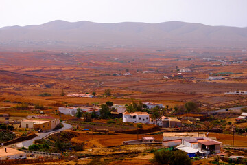 Landscape view with red volcanic earth in the center of the Canary Island of Fuerteventura, Spain.