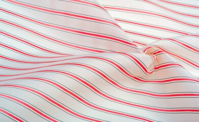 textured pattern, composite textile, dense silk fabric, white with red and gray lines, dash on fabric, narrow stripe. feature, line, stroke, dash, trace