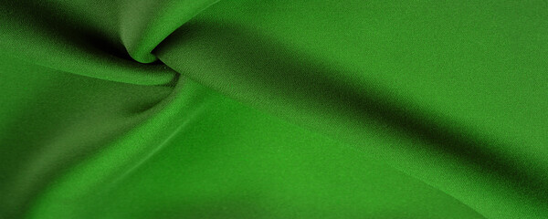 Silk green fabric. Emerald-silk fabric, lightweight silky and comfortable creates a durable silky drape as well as versatility, making it suitable for a wide variety of design applications