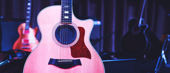 Acoustic guitar. Musical instrument with on stage in Concert.