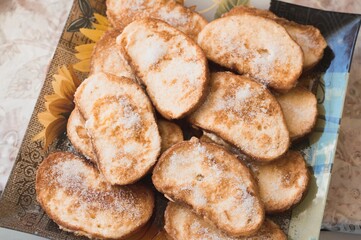 Toast fried in egg and sprinkled with sugar