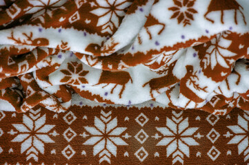 Velvet. Plush. For winter wear. Snow deer, snowflakes. Brown and white tones. Silk fabric with soft, smooth and thick pile. Rich Silk Cloth.