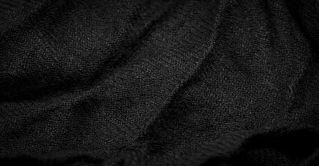 Black rough woolen fabric. Sheep with long, durable, coarse-fiber wool,   especially suited to your design. As with various large breeds of lamb of English origin. Texture background pattern