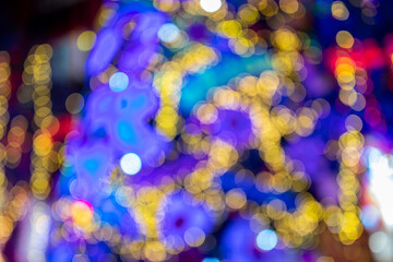 Blur light celebration on christmas tree, happy new year colorful background.