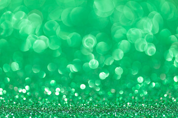 sparkles of Green glitter abstract background. Copy space