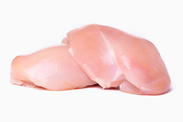 Two halves of chicken fillet isolated on a white background