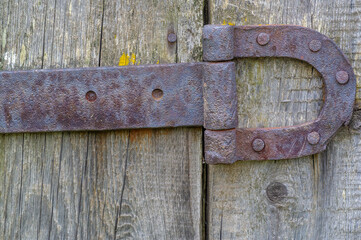 An old wooden building. boards. These houses are falling into disrepair and are increasingly being replaced with concrete ones. The unique form of fol