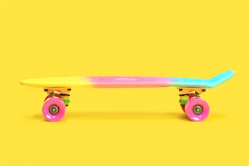 Foto op Aluminium Pastel neon rainbow colored Penny board skateboard isolated on solid yellow background. Plastic mini cruiser. Youth minimalistic Sport inspired summer fun concept. Copy space. © Aleksandra Konoplya