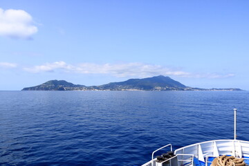 view to Ischia Ponte village and the coastline from the boat
