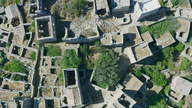 Greece Vatheia or Vathia old abandoned village, aerial pull out shot, Mani, Laconia Peloponnese	