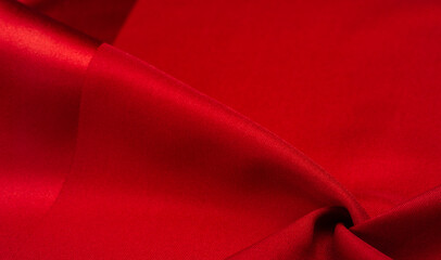 red silk fabric, this is silk satin weaving. Differs in density, smoothness and gloss of the front side, softness, Texture, background