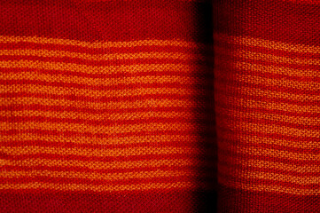 Texture. Background. Silk fabric red-burgundy, with a print of y