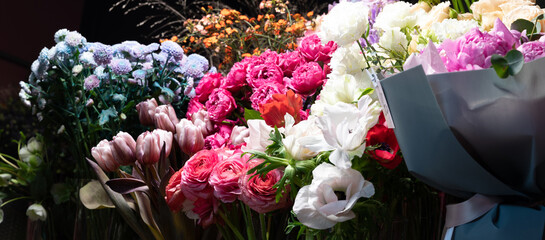 floristic arrangement of fresh cut flowers on a store shelf