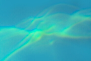 Beautiful lights and shadows on blue background. Overlay mode. Caustic effect of light. Shadows...