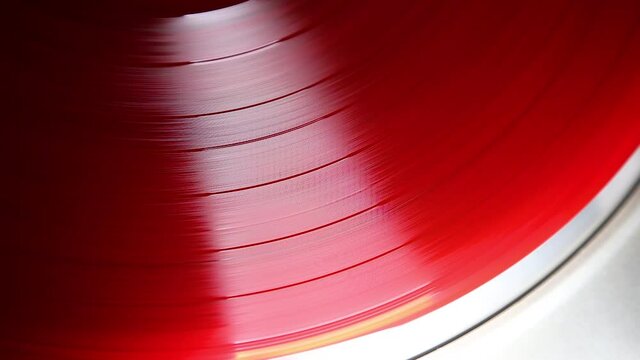 red vinyl record spinning 