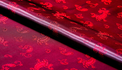 Texture, fabric, red silk with paisley pattern. This beautiful printed silk Charmeuse has a bold...