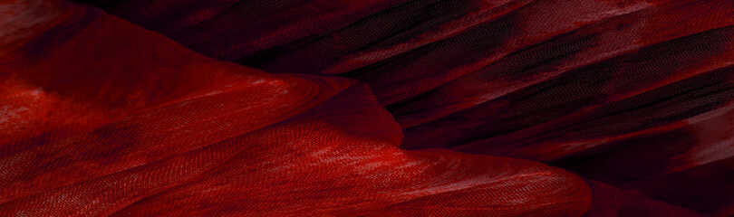 Red cloth. Silk fabric in fine organza with panther print, Crumpled texture. Background. Template.
