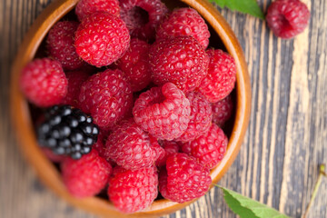 harvested red raspberries, close up