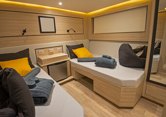 Interior of twin cabin on luxury yacht