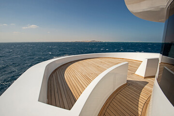 View from bow deck of luxury motor yacht at sea - Powered by Adobe