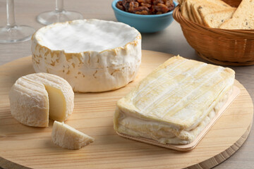 Fototapeta na wymiar Cheese board with variation of French cheese close up