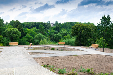 Europe, Russia.City landscape in summer, benches in the city park.