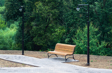 Europe, Russia.City landscape in summer, bench in the city park.