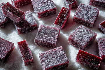 Raspberries and currant pate de fruit. Jelly, marmalade, fruit candy, covered with sugar.