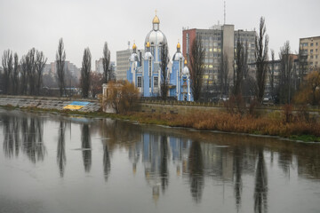 Fototapeta na wymiar Greek Catholic Church of Blessed Virgin Mary over the river Southern Bug in Vinnytsia, Ukraine. December 2021