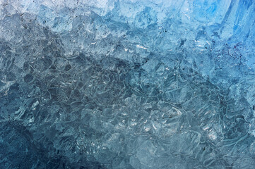 Natural ice texture with cracks. Vibrant Color of the Year 2022 veri peri, blue and violet.