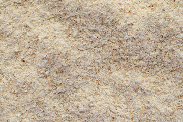 Rye flour background, top view. Texture, background from rye flour, top view. Chopped rye flour, top view.