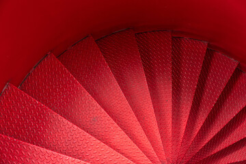 Outdoor metal red spiral staircase - 476786606