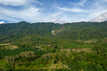Naklejka premium Mountain and waterfall in forest at Trang South of Thailand