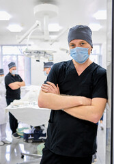 surgeon oversees the operation in the operating room