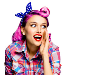 Portrait of pinup woman holding hand near open mouth, looking outside and saying something. Girl dressed in pin up style. Red purple haired model at retro fashion vintage concept, isolated over white.