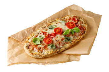 Small oval pizza baked dark rustic mixed wheat rye dough and cherry tomatoes, mozzarella and basil...