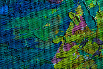 Abstract background closeup of a painting with brushstrokes. Rough art paint smear. Large multicolor spots of brush strokes and palette knife on the canvas