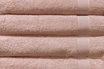 Stack of fluffy towels in store. Background