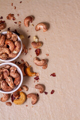 cashews isolated on light background. Top view. Flat lay