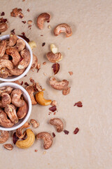 cashews isolated on light background. Top view. Flat lay