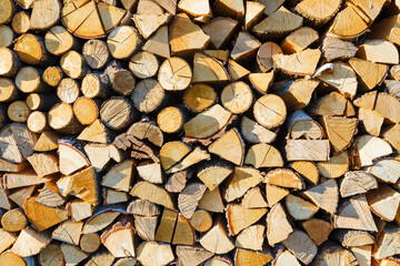 Pile of wood for heating. Brown color.