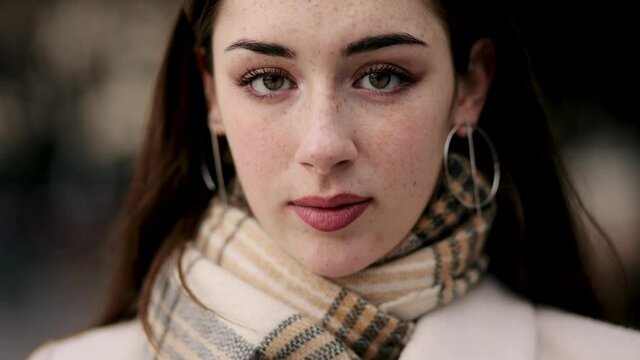 Beautiful Young woman with lovely freckles. Female model have long nice Eyelashes. Natural Beauty